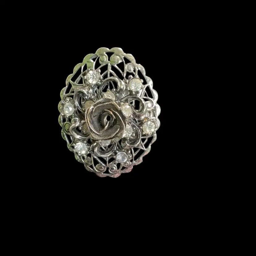 Vintage Silvertone Rosebud Brooch. Oval Shape Filigree With Clear Glass Rhinstones.Not Signed