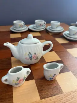 #01 A miniature porcelain toy tea set with floral decoration. -Pretty Port LTD Made In China