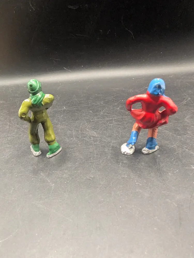 Vintage Set of 2 Barclay Type Metal Hand Painted Skaters Boy and Girl.