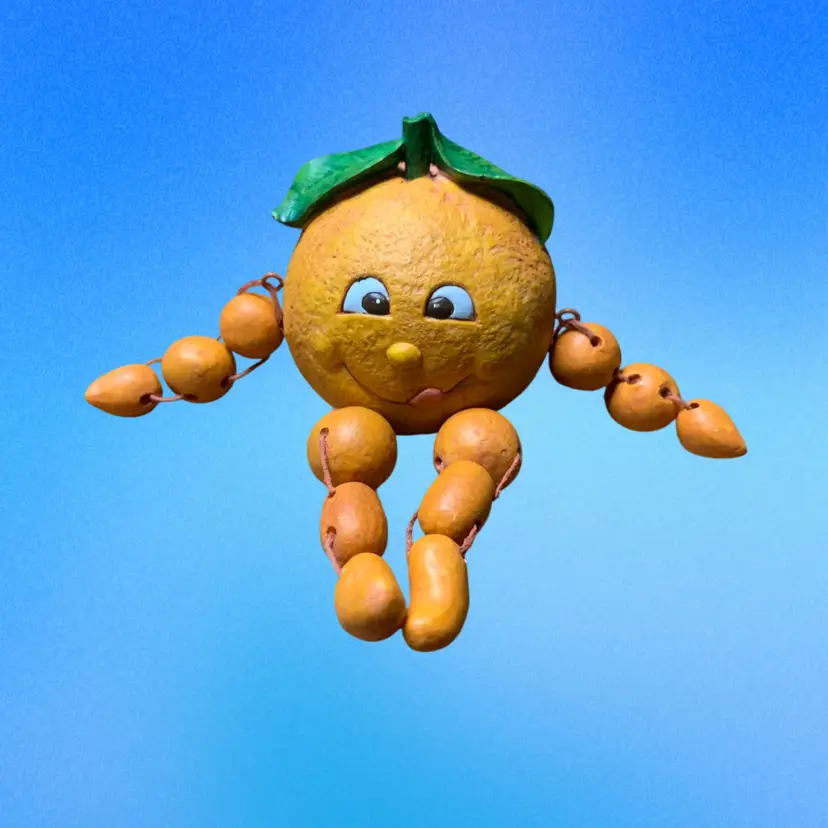 01. anthropomorphic orange shelf sitter figurine with dangly legs Shelf Sitter 3” Tall