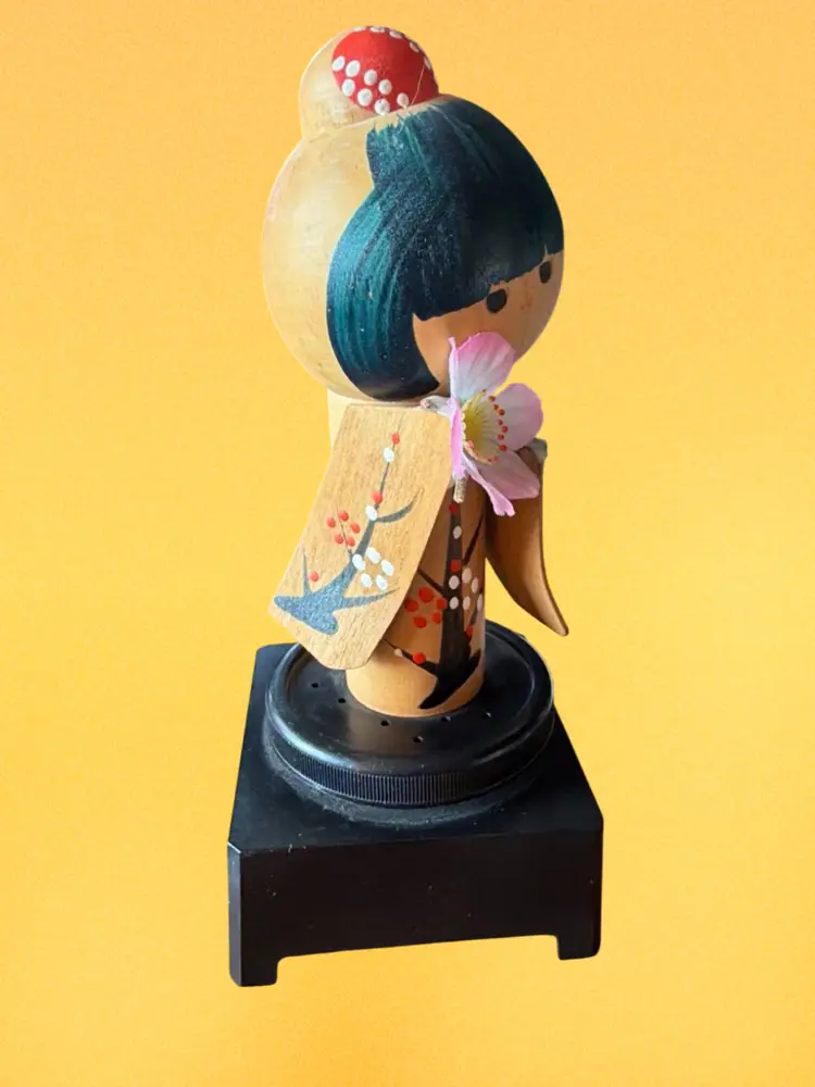 Vintage Japanese Kokeshi Wooden Figure on Music Box   7” X  3” Works Great!