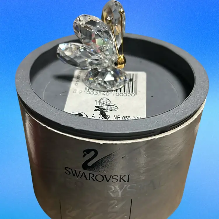 A faceted crystal Butterfly figurine by Swarovski with original packaging. Great Christmas Gift Idea