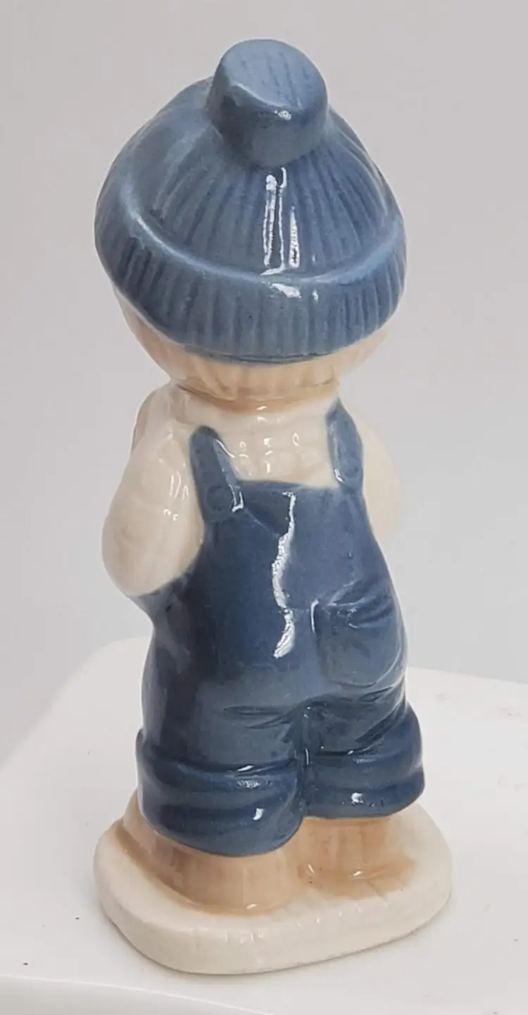 Porcelain Figurine Boy Carrying Firewood
