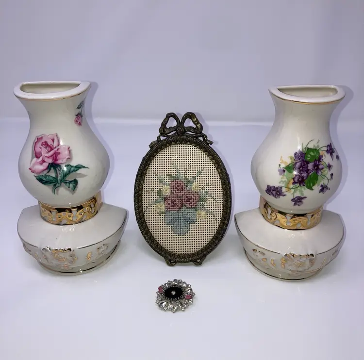 Fabulous Floral Vignette Vintage Frame With Needlepoint Florals (5 1/2” Tall 3 3/4” Wide) 2 Porcelain Lamp Shaped Floral Wall Pockets (6 3/4” Tall 4” Wide) Vintage Hobē Rhinestone Single Clip On Earring (1 1/2” x1”)