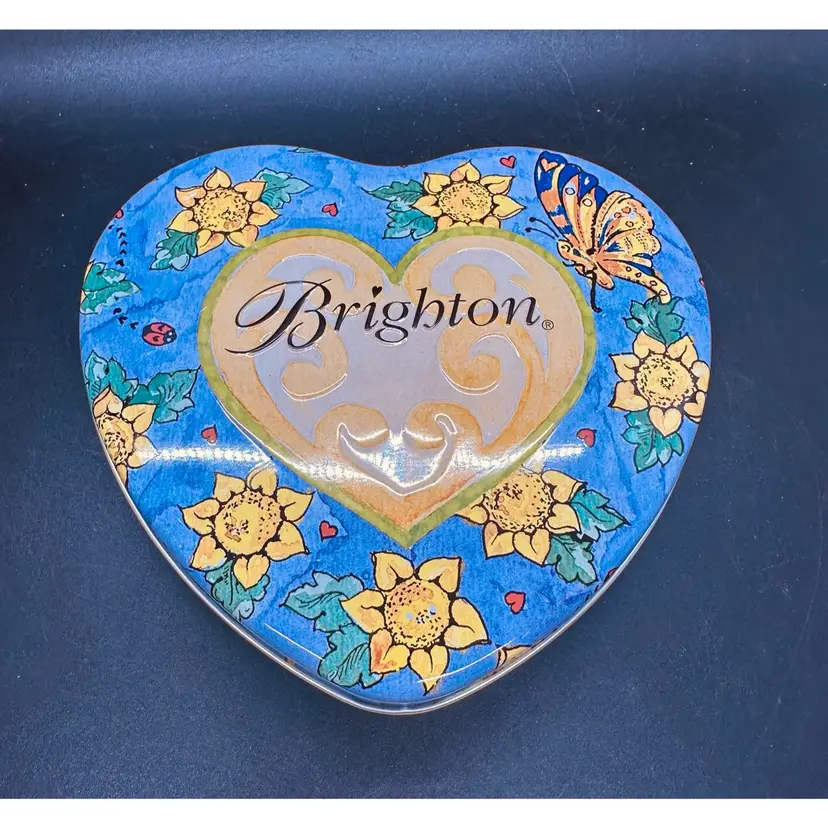 104. VTG Heart-shaped tin jewelry box by Brighton