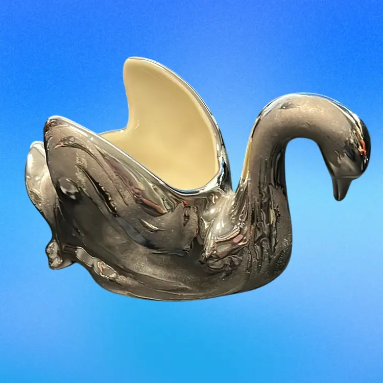 This is a vintage Swetye Ceramics Swan planter with a Weeping Silver glaze. MCM, 4”x7” Long Made In Salem, Ohio 1950s Unique Weeping Glaze Design!