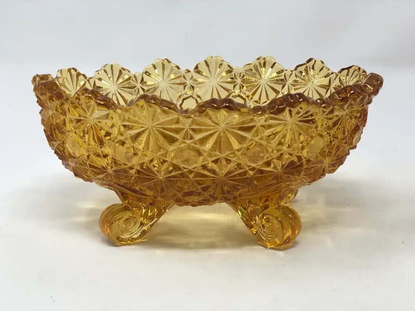 Daisy and Button Amber Glass Four Footed Scalloped Candy Dish