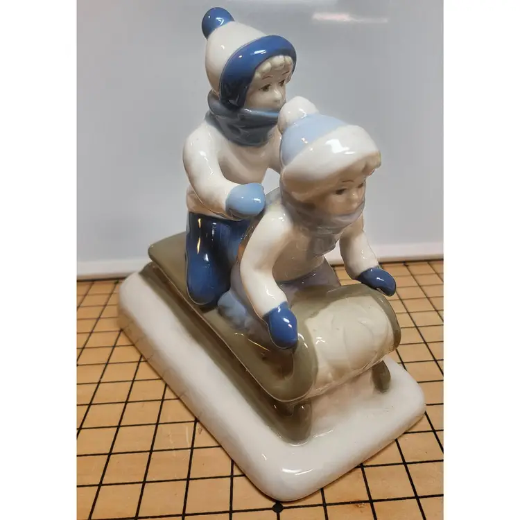 Paul Sebastian PS Porcelain Figurine Twp Children On A Sled