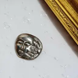 Vintage Silver Masquerade Face Brooch with Beautiful Feather Detail