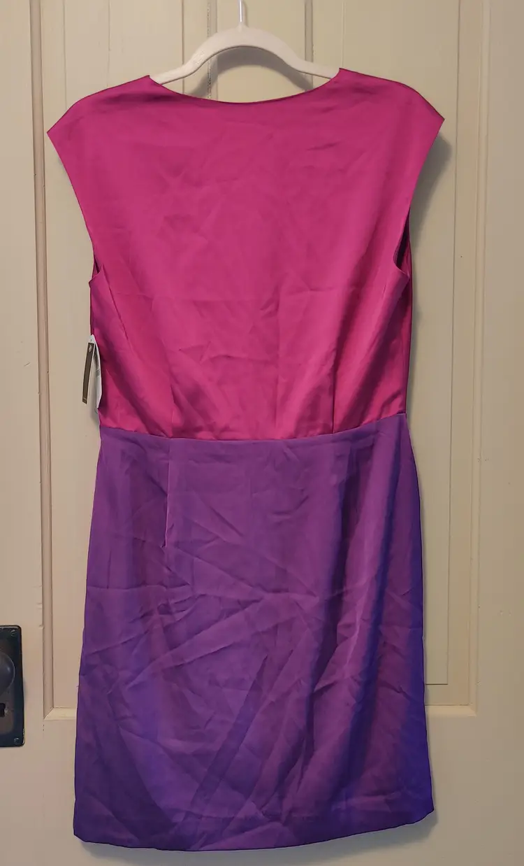 Dress- Brand: Vince Camuto. Size 8. NWT. Retail $140. 2 tone purple dress. Shell- 97% polyester, 3% spandex. Lining- 100% polyester. No callouts.