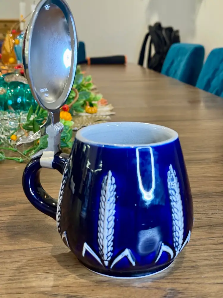 Vintage traditional German beer stein, also known as a Bierkrug.