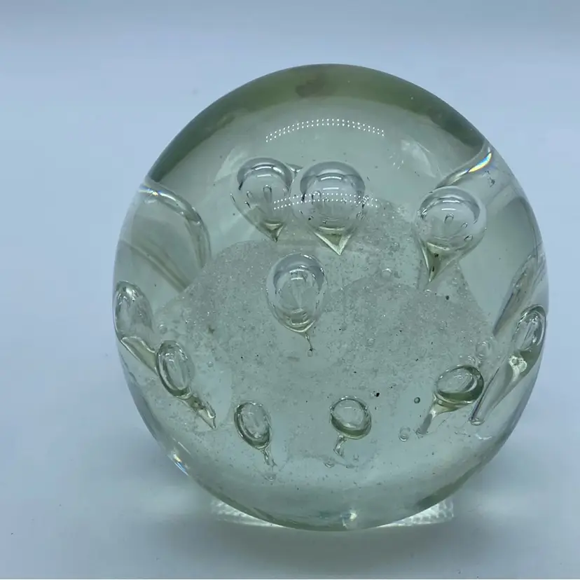 #0052 Vintage clear glass paperweight with controlled air bubbles.