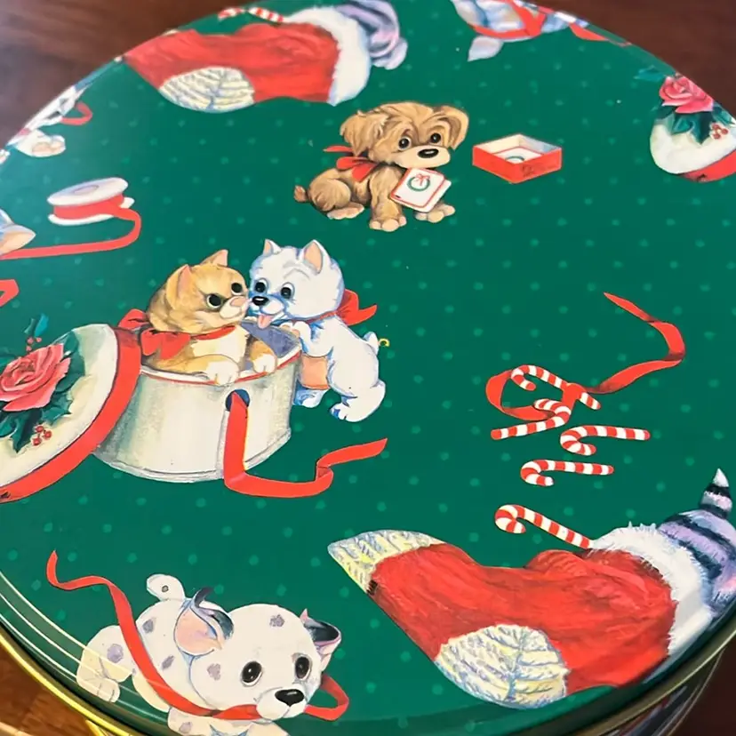 #01 A Cherished Teddies Christmas-themed decorative tin. 6.5” X3”