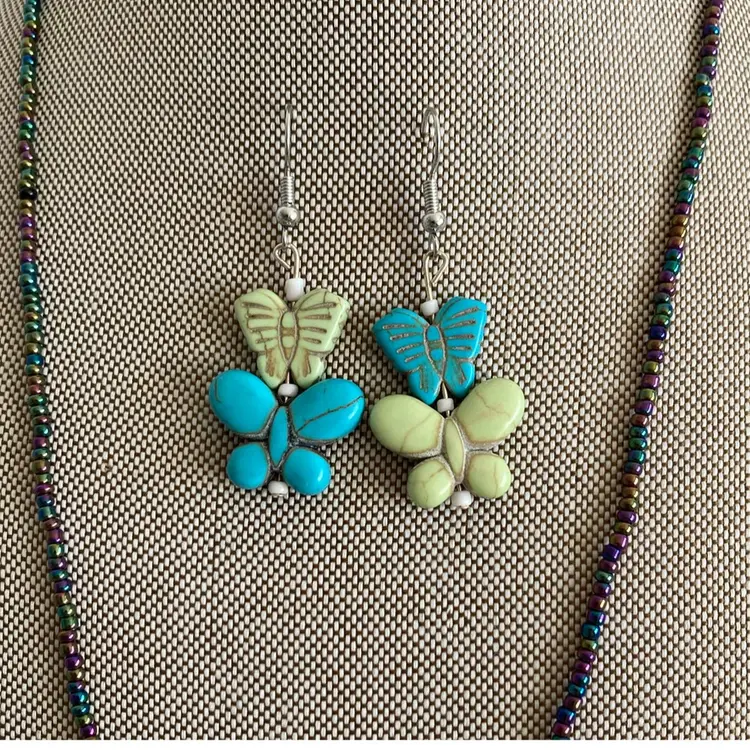 Iridescent Aurora Borealis Beaded Necklace with Carved Howlite Butterflies And Matching Earrings