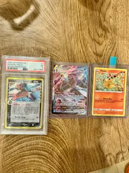 PSA graded Pokémon card lot Deoxys- halo with victini and inteleonVmax in case