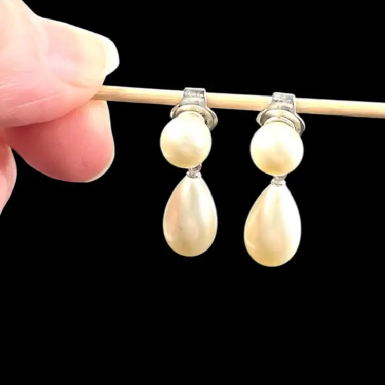 Crown Trifari Signed Mid-century 1” Faux Double Pearl Clip On Dangle Earrings in Silver-tone Metal.