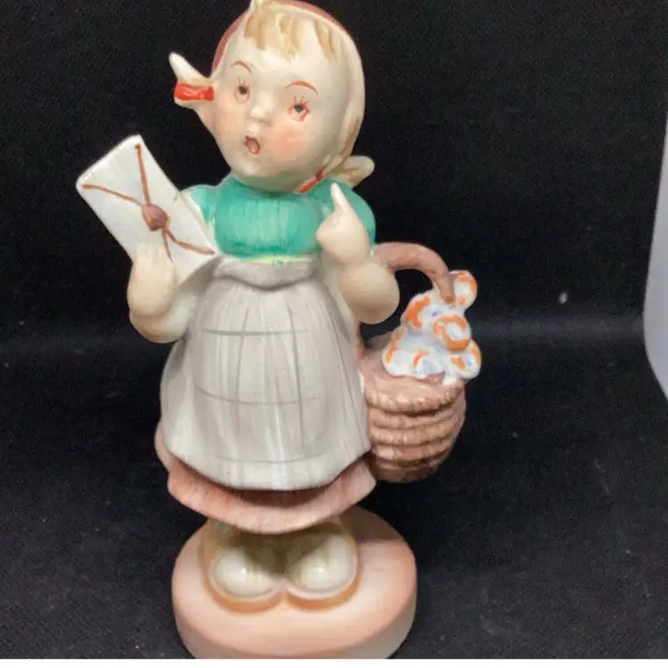 Hummel like little girl signed on the bottom with sticker sphinx