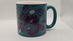 Alice in Wonderland Teal Ceramic Mug with Cheshire Cat and Rabbit Hole Interior