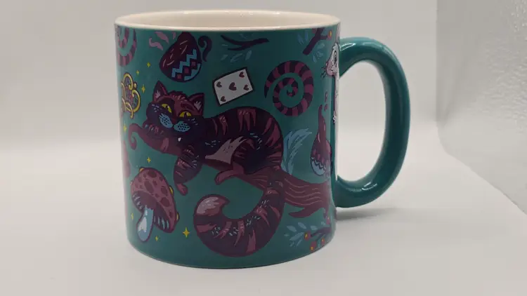 Alice in Wonderland Teal Ceramic Mug with Cheshire Cat and Rabbit Hole Interior
