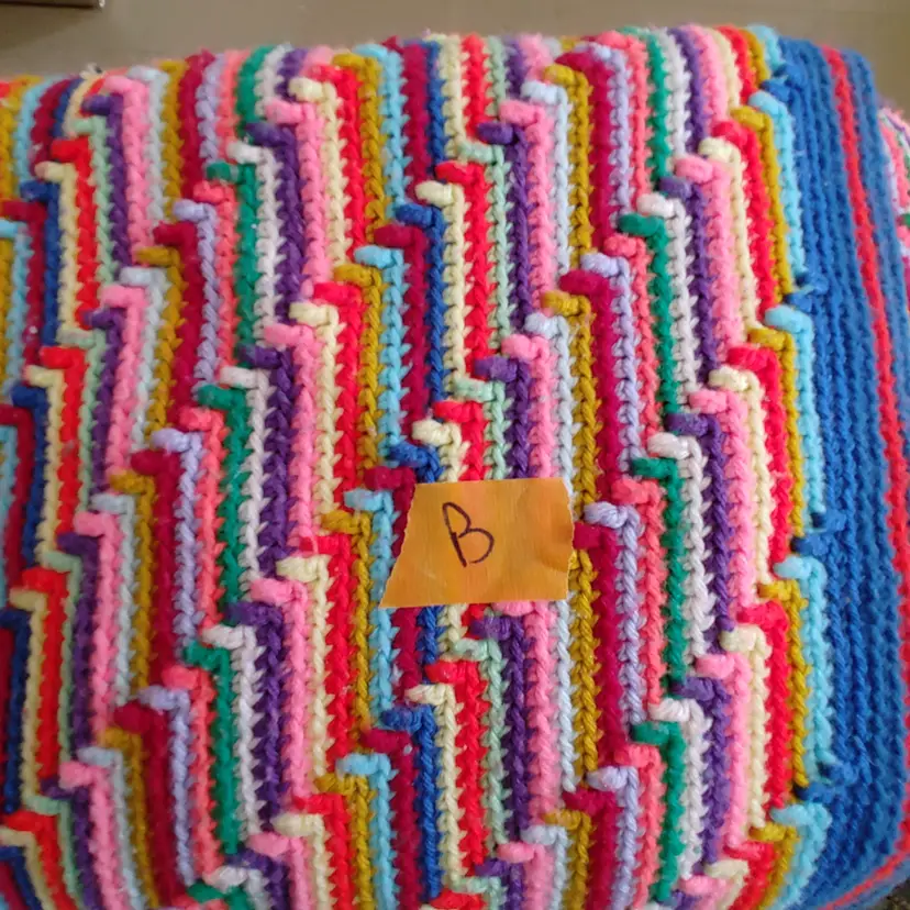 Afghan B- approx size 77 x 64. Multi color zig zag stripes. As shown.