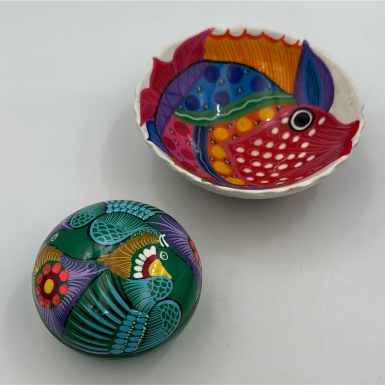A Set Of Two Mexican folk art pottery footed on one
