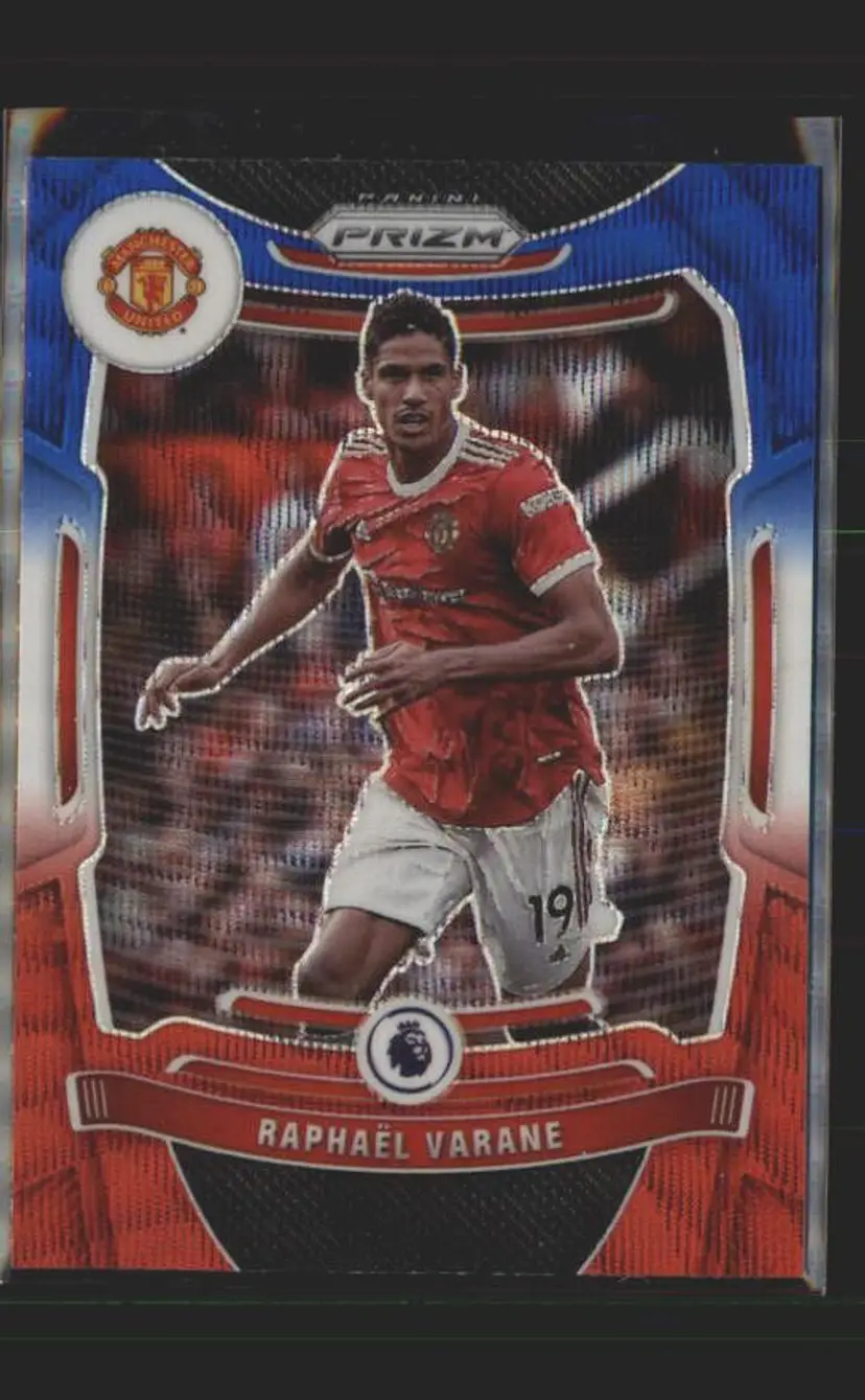 2021-22 Prizm EPL #276 Raphael Varane Prizms Red White and Blue - ( 138 ) - Manchester United