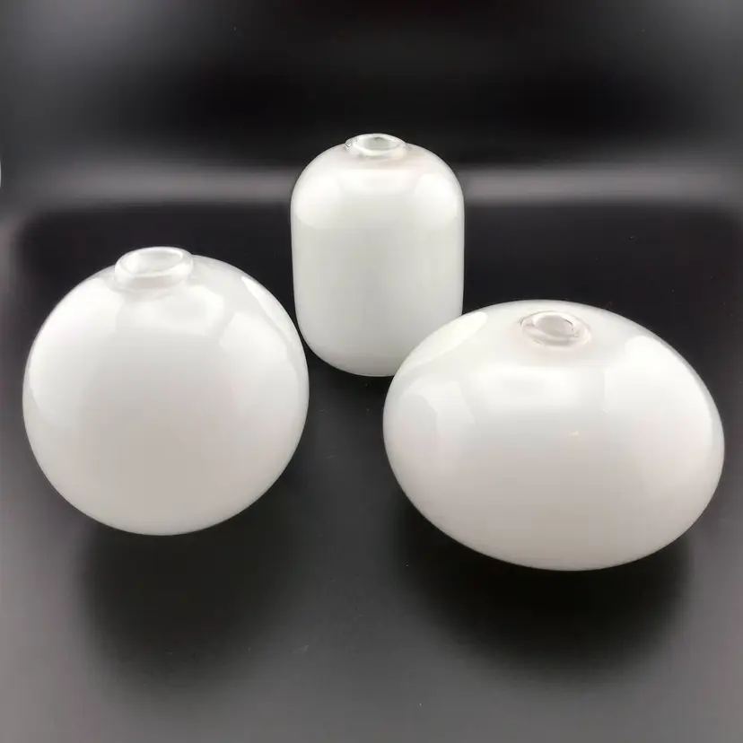 3 white blown glass bud vases