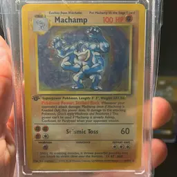 1999 Pokémon Base Set 1st Edition Machamp Holo (#8)