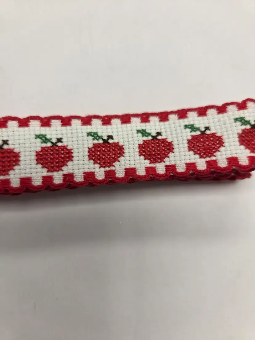 New Cross-stitched Ribband piece apple themed great for adding to a craft.