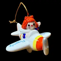 1982 Schmid Flying High Raggedy Ann Ceramic Christmas Ornament