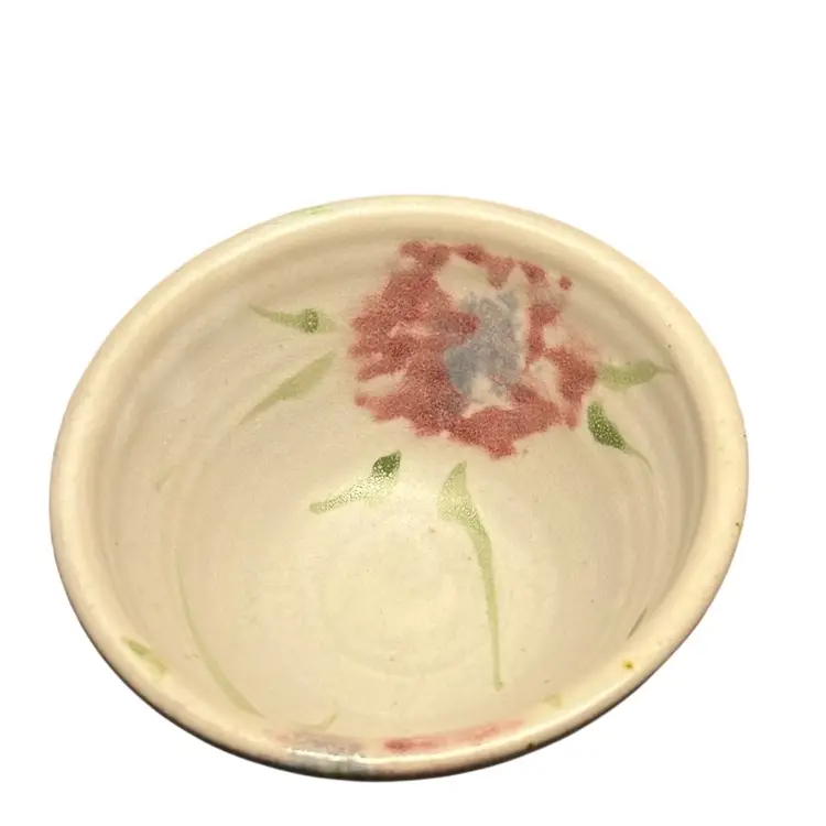Hand Made Pottery Bowl Painted In Soft
Pastels.