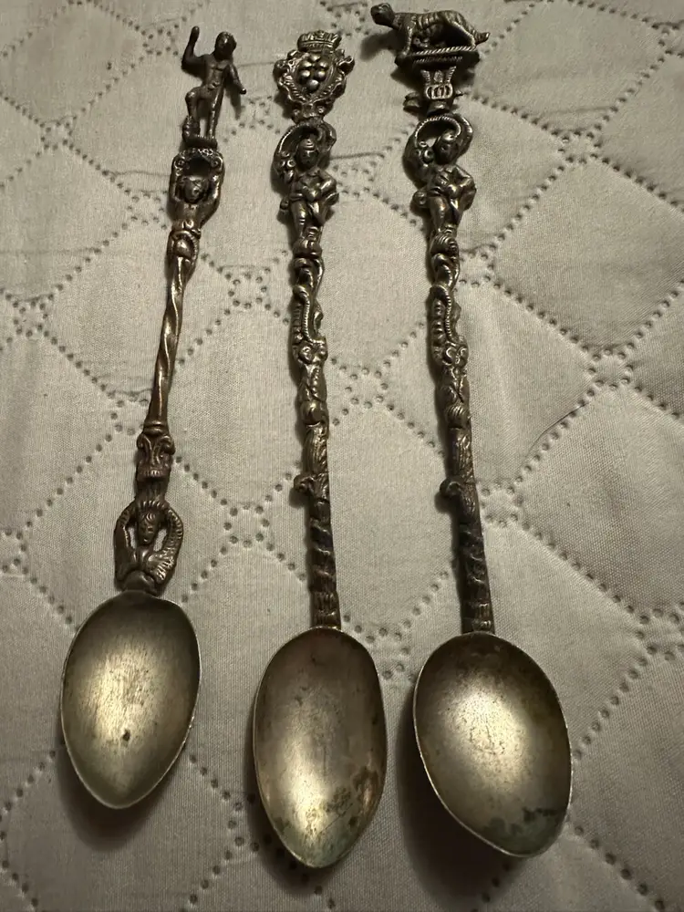 Italian silverplate decorative spoons with figural handles. Set Of 3