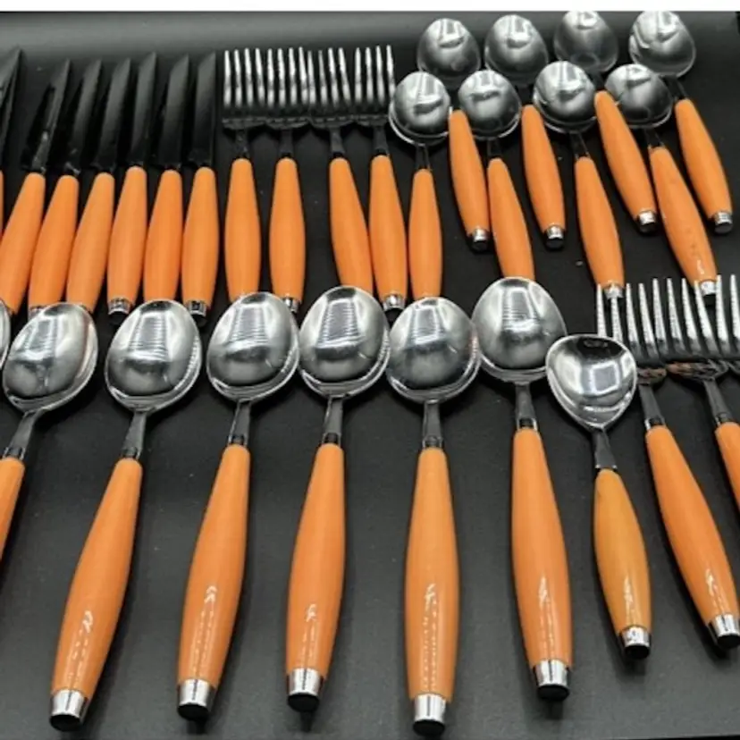 33 pieces of Orange Fiesta Flateware