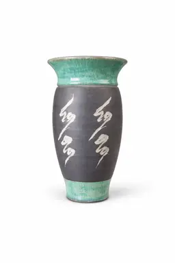 Beautiful signed studio pottery vase by D. Moody (1996). Hand-thrown with a charcoal body, carved detailing, and  turquoise crackle