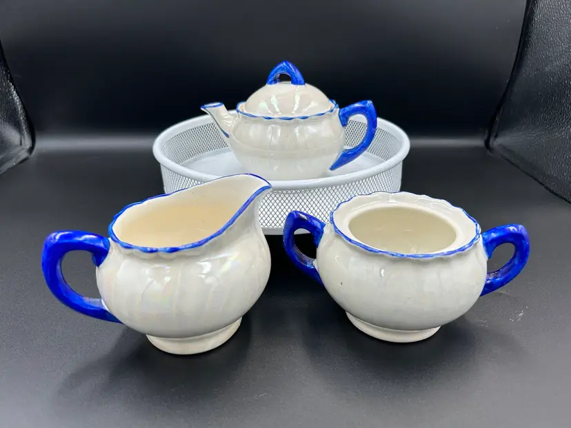 Three Piece Lusterware Tea Pot, Sugar Bowl And Creamer