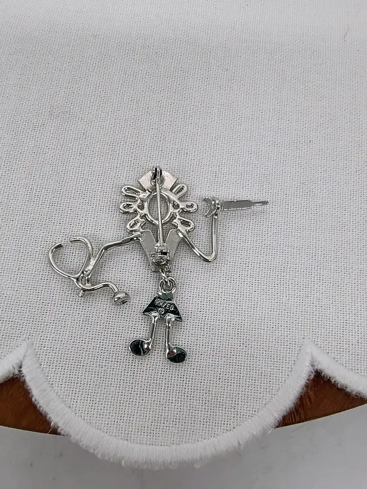 Nurse Brooch Pin Articulated Shot & Stethoscope Silver Tone with white Enamel Accent by KK ED