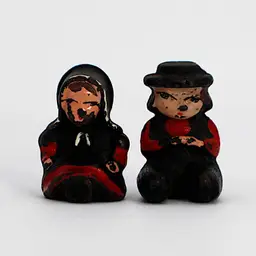 Wilton Cast Iron Pair of Amish Figurines Sitting Boy And Girl