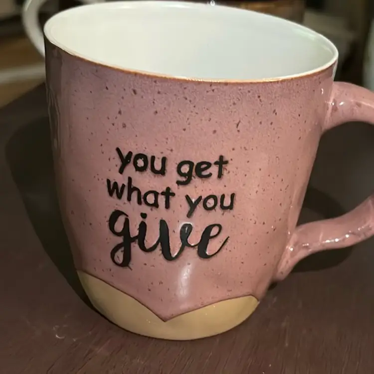 Beautiful Pink And Tan Mug With Chocolate Brown Writing Reminding Us - You Get What You Give