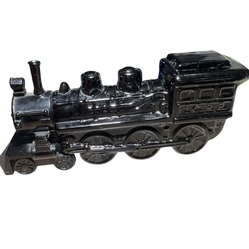 This is a vintage Avon "Cannonball Express" glass aftershave decanter.(empty)