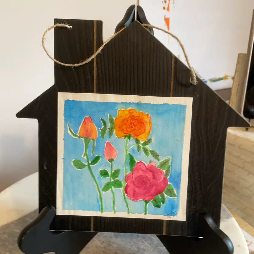 Roses On Wooden House