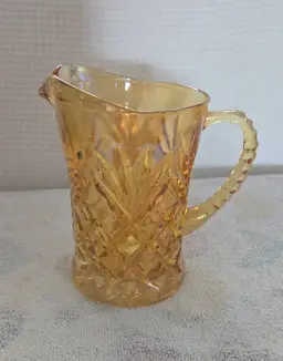 Vintage Carnival Marigold Pressed Glass Creamer In The Sunburst Fan Or Diamond Pattern With Ribbed Handle