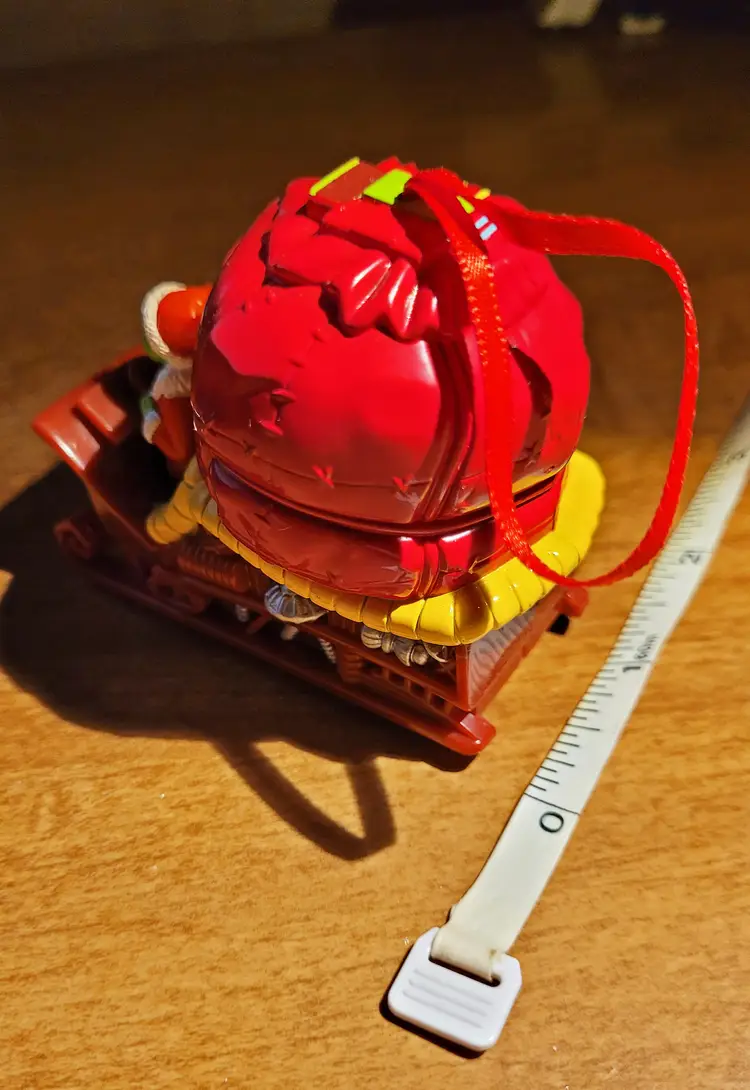 Vintage Dr. Seuss Grinch Rolling Sled Ornament c. 2000