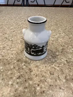 Ceramic mini milk jug/personal creamer with black design, stamped Switzerland