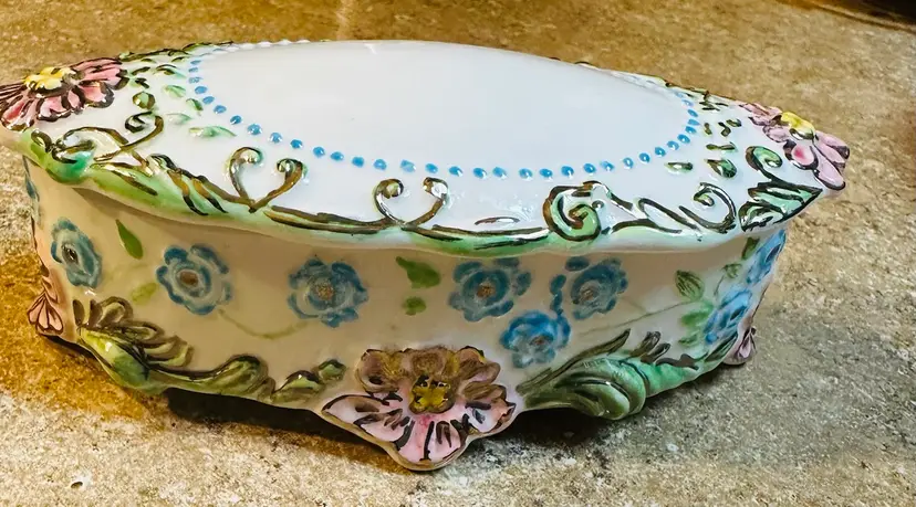 Vintage hand painted porcelain trinket box.