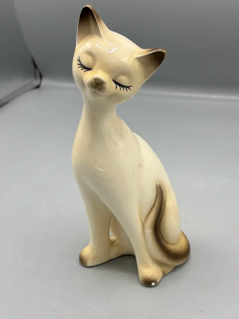 Napcoware ceramic ceramic sitting cat with painted eyelashes