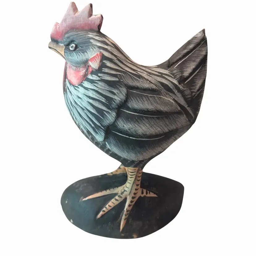 This is a vintage, hand-carved, and hand-painted wooden rooster figurine.It features rustic farmhouse styling with a black body, grey detailing, and a red comb.