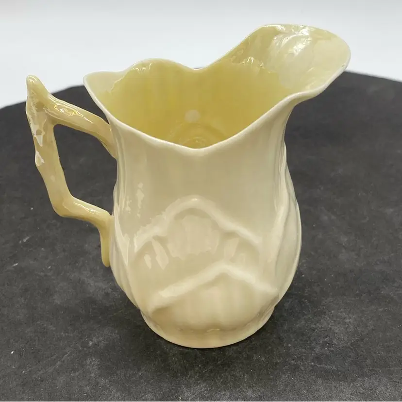 #2109 Belleek porcelain shell vase with a green mark, dating 1946-1955.