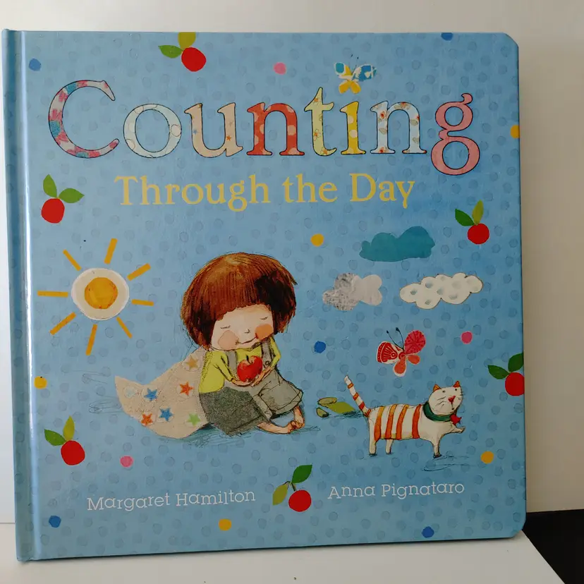 Counting Through the Day by Margaret Hamilton. Great book for teachers.