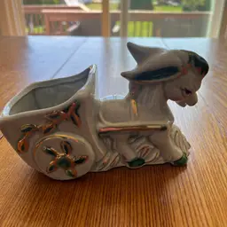 Vintage ceramic donkey cart planter with gold and green accents.  6.5x4.5”