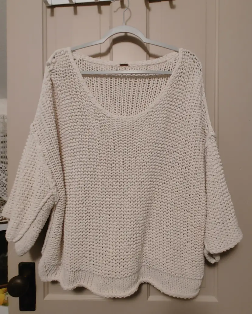 Top- Brand: Free People. Size Medium. Cream knit top. Material- 80% cotton, 20% nylon. No callouts.